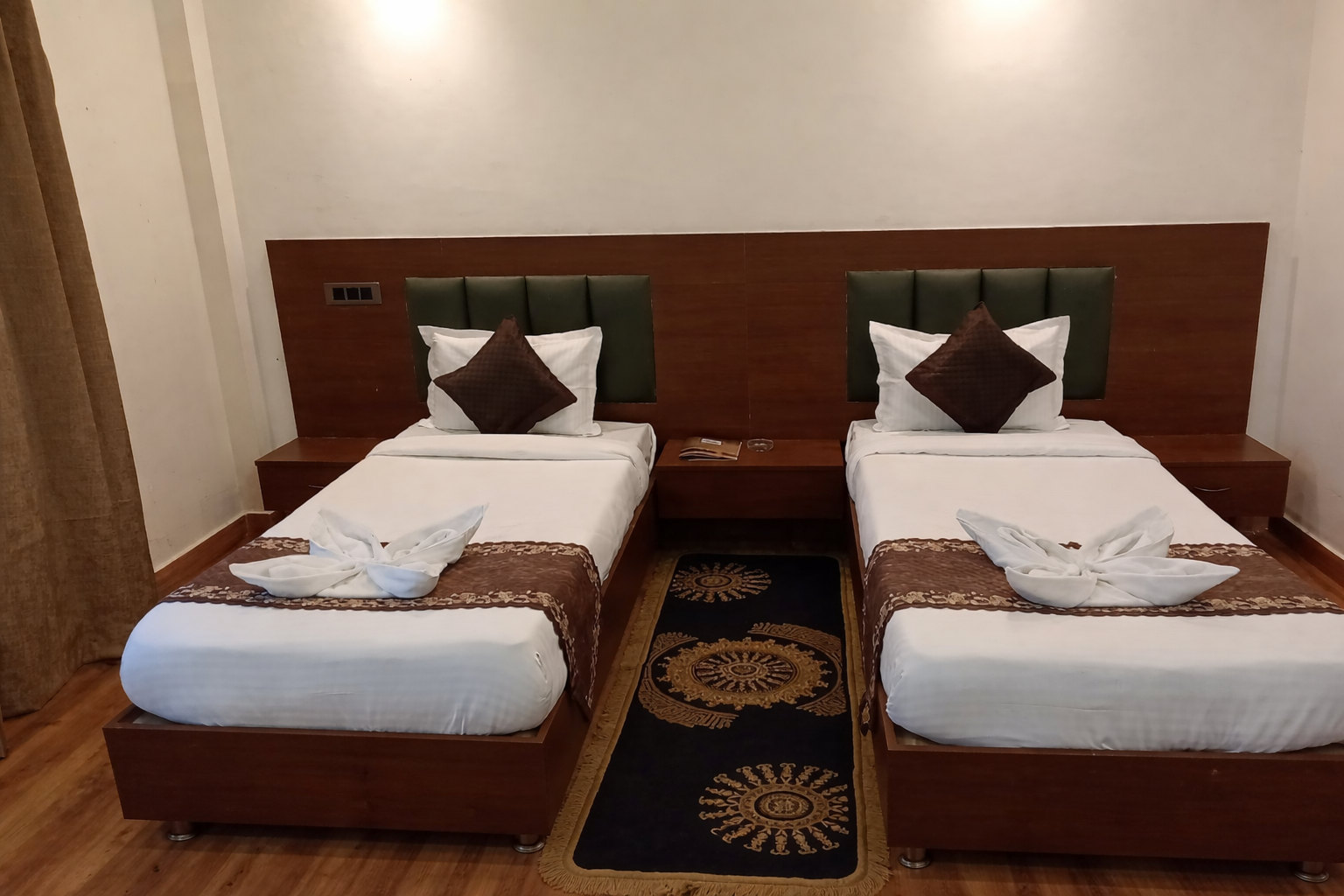 Wooden walkway through dense green forest